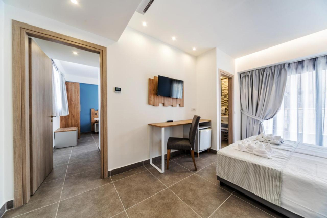 ULTRA LAST MINUTE INSULA CRETA  4**** DEMIPENSIUNE  POLLIS HOTEL ZBOR DIN OTOPENI  CU TAXE INCLUSE