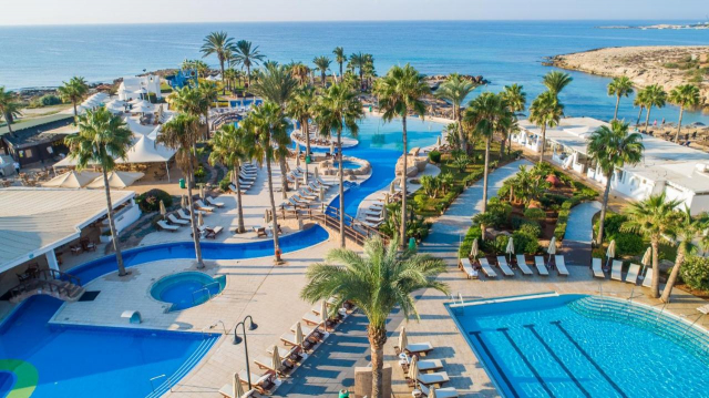 ULTRA LAST MINUTE DELUXE PE PLAJA IN CIPRU ADAMS  BEACH HOTEL 5***** DEMIPENSIUNE ZBOR DIRECT DIN OTOPENI CU TAXE INCLUSE